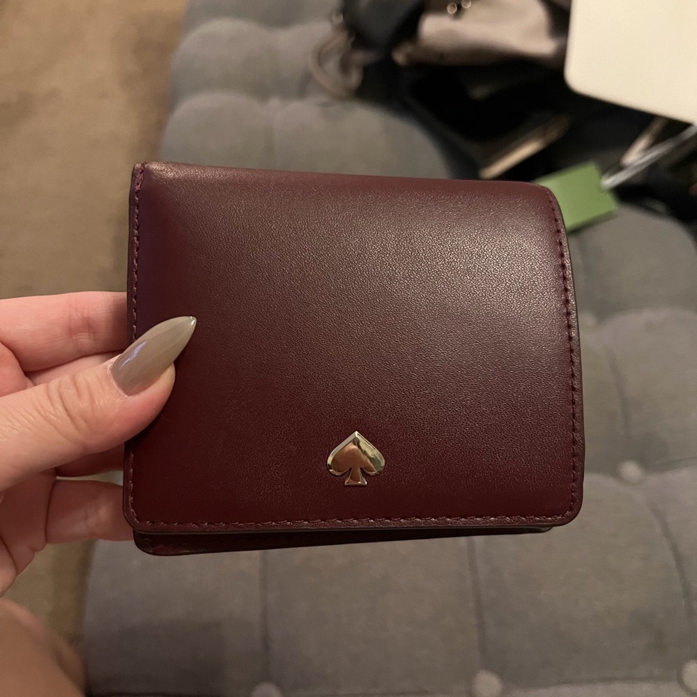 kate spade burgundy leather compact wallet with gold spade